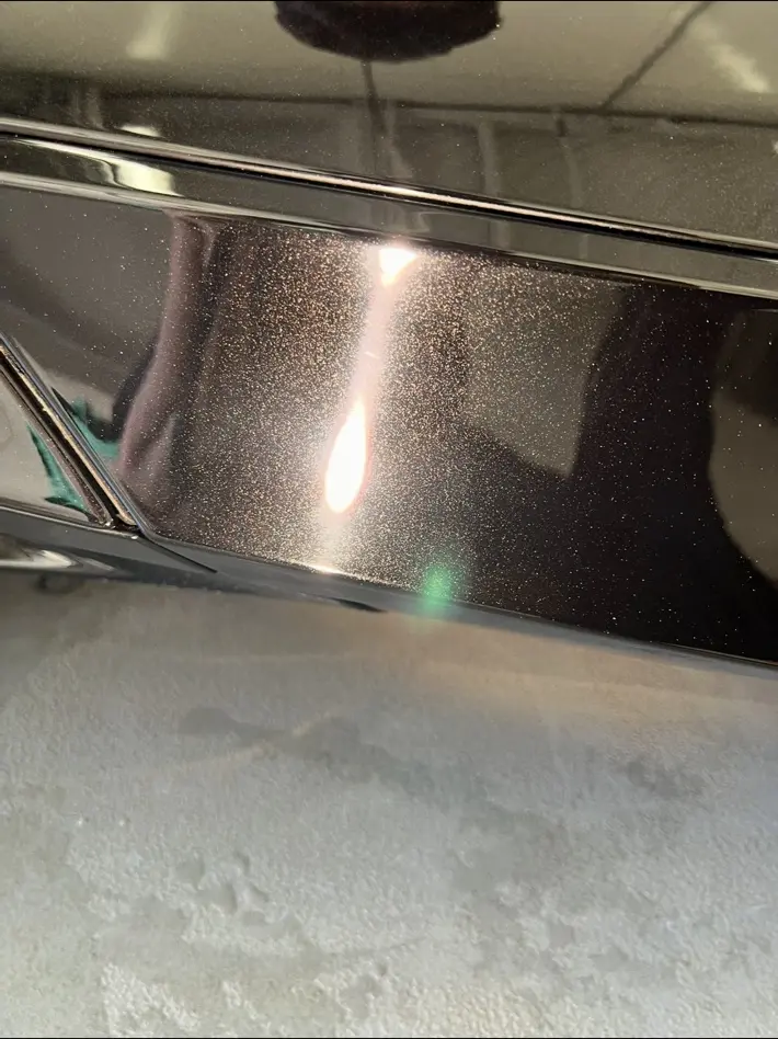 Black painted panel after scratch correction