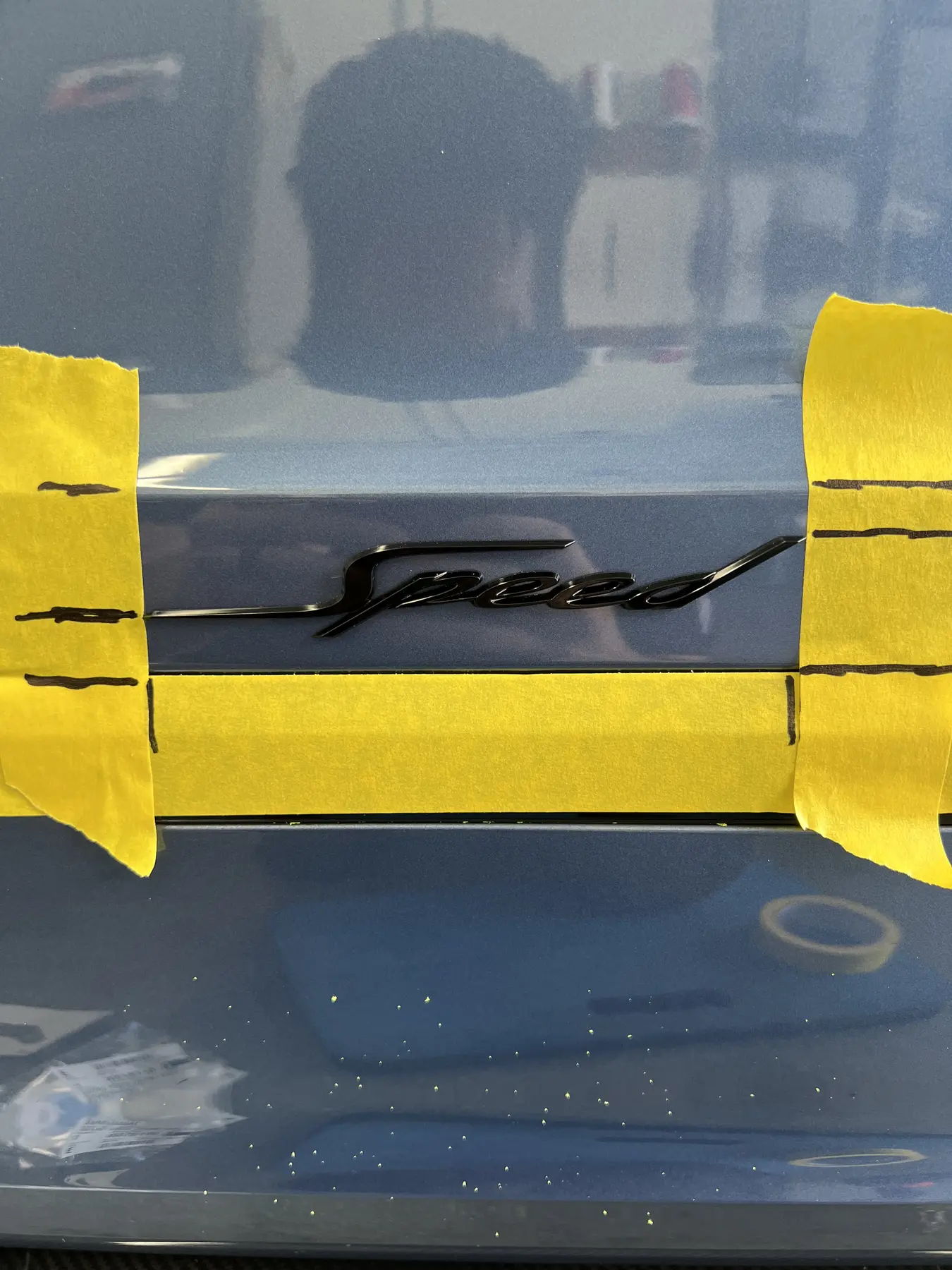 Porsche-script body panel after correction