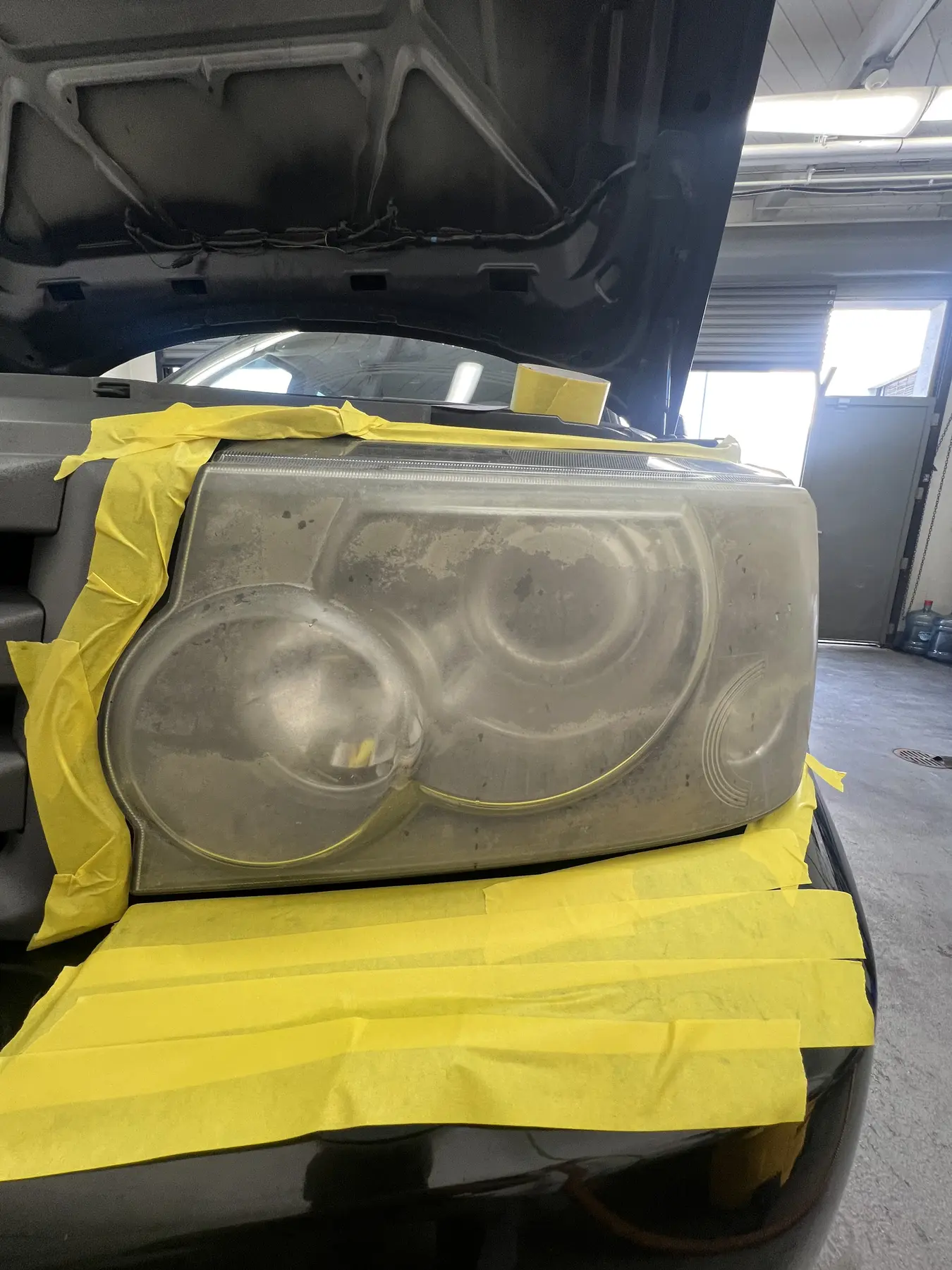 Cloudy headlight before restoration