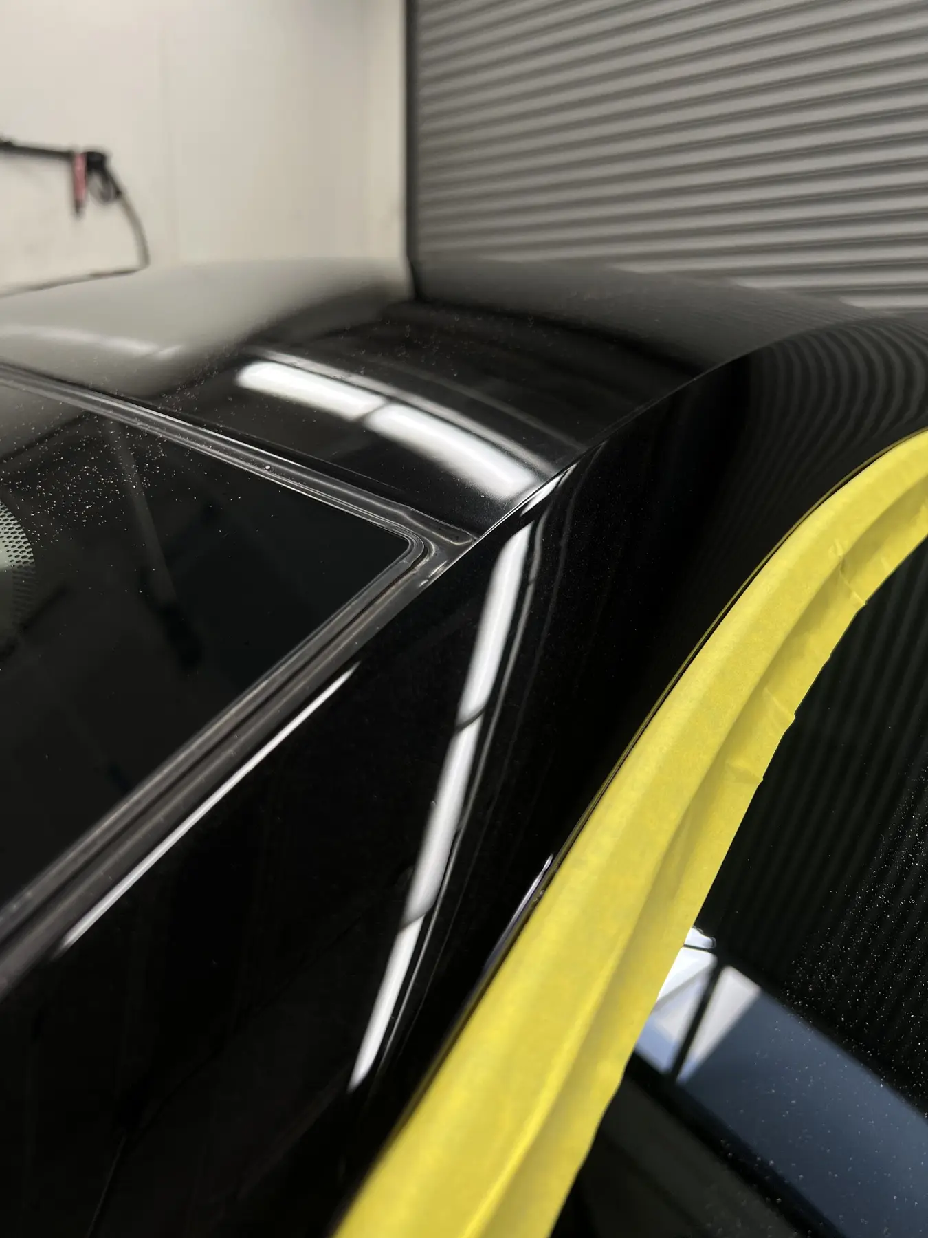Black roof panel after paint correction