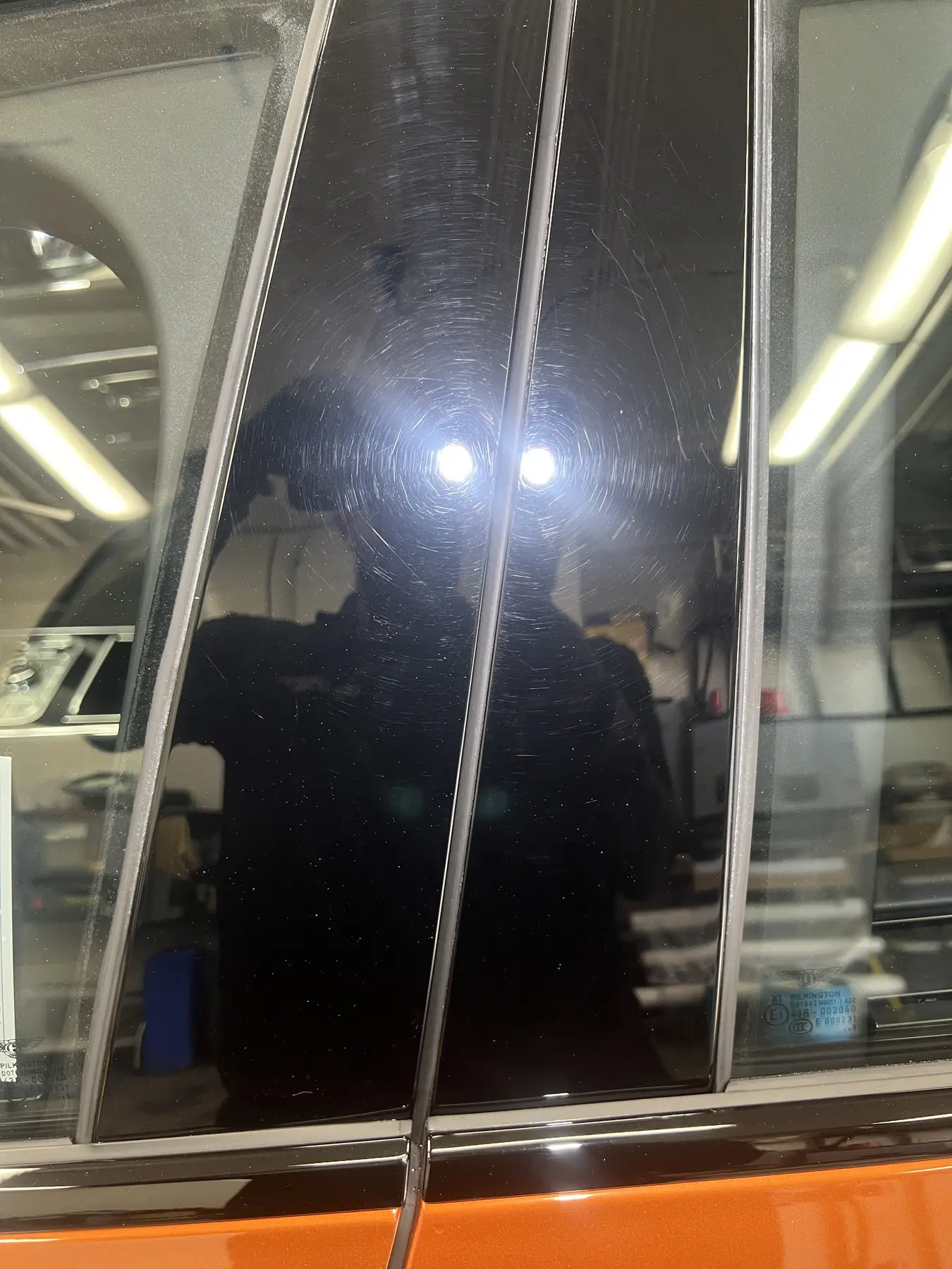 Black pillar with visible defects before correction